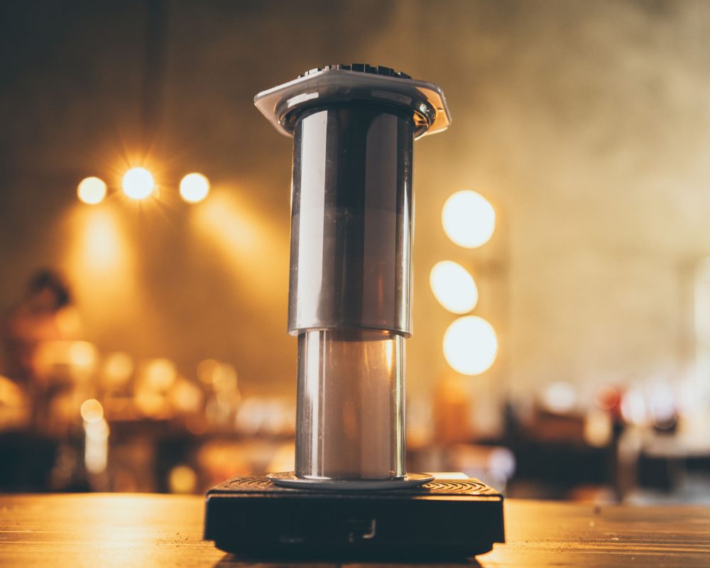 slow bar coffee cafe concept, barista maker are making a hot drink into a cup, vintage filter mage